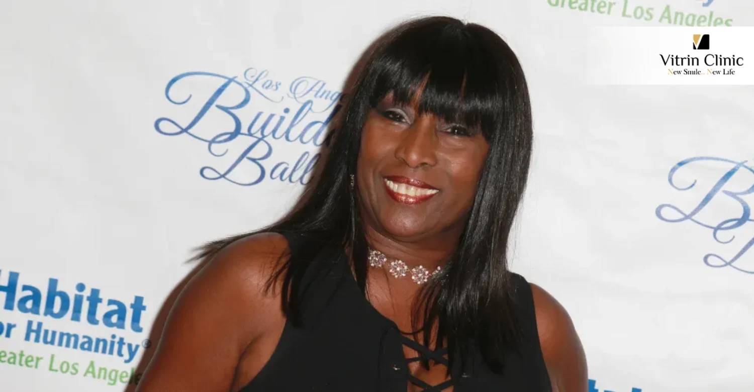 The Signature Kiki Shepard Smile